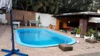 Foto 13 de Casa com 4 Quartos à venda, 273m² em Vila Nova, Porto Alegre