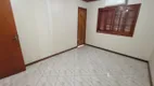 Foto 2 de Casa com 3 Quartos à venda, 151m² em Vila Nova, Porto Alegre