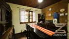 Foto 11 de Casa com 4 Quartos à venda, 185m² em Vila Nova Suica, Campos do Jordão