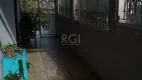 Foto 3 de Casa com 6 Quartos à venda, 256m² em Vila Nova, Porto Alegre