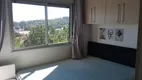 Foto 2 de Apartamento com 2 Quartos à venda, 49m² em Vila Nova, Porto Alegre