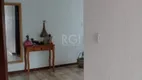 Foto 13 de Casa com 6 Quartos à venda, 254m² em Vila Nova, Porto Alegre