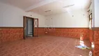 Foto 13 de Casa com 3 Quartos à venda, 259m² em Rio Branco, Porto Alegre