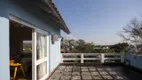 Foto 10 de Casa com 6 Quartos à venda, 486m² em Vila Nova, Porto Alegre