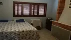 Foto 17 de Sobrado com 4 Quartos à venda, 216m² em Restinga, Porto Alegre