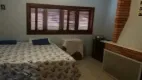 Foto 17 de Sobrado com 4 Quartos à venda, 218m² em Restinga, Porto Alegre