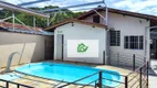 Foto 17 de Casa com 4 Quartos para alugar, 240m² em Centro, Caraguatatuba