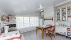 Foto 16 de Casa com 5 Quartos à venda, 270m² em Vila Nova, Porto Alegre