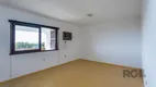 Foto 37 de Casa com 4 Quartos à venda, 372m² em Nonoai, Porto Alegre