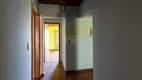 Foto 30 de Casa com 4 Quartos à venda, 142m² em Vila Nova, Porto Alegre