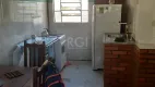 Foto 17 de Casa com 5 Quartos à venda, 302m² em Vila Nova, Porto Alegre