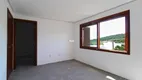 Foto 14 de Casa de Condomínio com 3 Quartos à venda, 240m² em Vila Nova, Porto Alegre