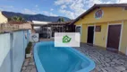 Foto 10 de Casa de Condomínio com 4 Quartos à venda, 174m² em Massaguaçu, Caraguatatuba