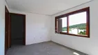 Foto 10 de Casa de Condomínio com 3 Quartos à venda, 225m² em Vila Nova, Porto Alegre