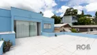 Foto 24 de Casa com 5 Quartos à venda, 313m² em Vila Nova, Porto Alegre