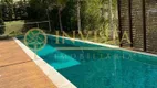 Foto 2 de Casa de Condomínio com 4 Quartos à venda, 488m² em Cacupé, Florianópolis