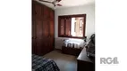 Foto 14 de Casa de Condomínio com 4 Quartos à venda, 195m² em Teresópolis, Porto Alegre