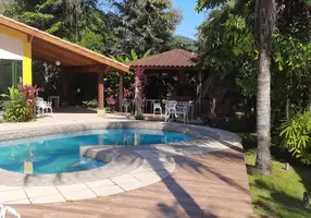 Foto 1 de Casa com 4 Quartos à venda, 212m² em Balneário Praia do Pernambuco, Guarujá