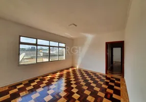Foto 1 de Apartamento com 4 Quartos à venda, 94m² em Navegantes, Porto Alegre