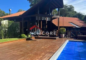 Foto 1 de Casa de Condomínio com 4 Quartos à venda, 300m² em Villagio, Gramado