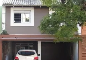 Foto 1 de Casa com 4 Quartos para alugar, 380m² em Auxiliadora, Porto Alegre