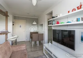 Foto 1 de Apartamento com 2 Quartos à venda, 59m² em Teresópolis, Porto Alegre