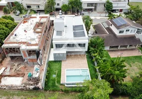 Foto 1 de Casa de Condomínio com 5 Quartos à venda, 453m² em Alphaville Ipe, Goiânia