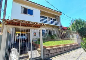 Foto 1 de Casa com 4 Quartos à venda, 249m² em Cavalhada, Porto Alegre