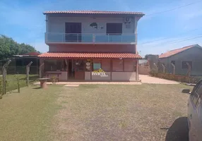 Foto 1 de Sobrado com 4 Quartos à venda, 300m² em Albatroz, Imbé