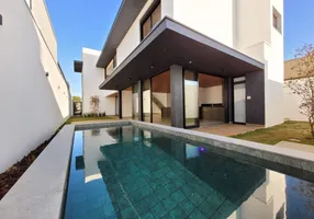 Foto 1 de Casa de Condomínio com 4 Quartos à venda, 255m² em Aclimacao, Uberlândia