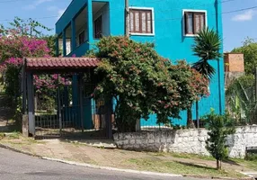 Foto 1 de Casa com 3 Quartos à venda, 243m² em Partenon, Porto Alegre