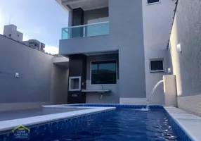 Foto 1 de Sobrado com 3 Quartos à venda, 135m² em Vila Tupi, Praia Grande