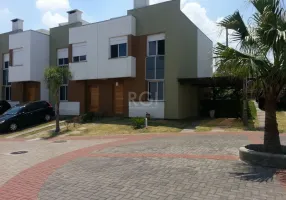 Foto 1 de Casa de Condomínio com 3 Quartos à venda, 96m² em Mário Quintana, Porto Alegre