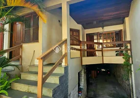 Foto 1 de Casa com 4 Quartos à venda, 420m² em Passo da Areia, Porto Alegre