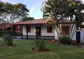 Foto 1 de Casa de Condomínio com 3 Quartos à venda, 300m² em Escarpas do Lago, Capitólio