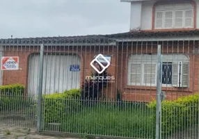Foto 1 de Casa com 5 Quartos à venda, 240m² em Centro, Pelotas