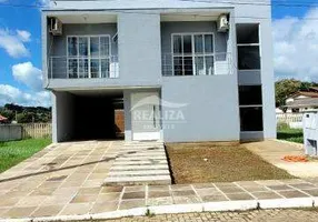 Foto 1 de Casa de Condomínio com 3 Quartos à venda, 232m² em Tarumã, Viamão