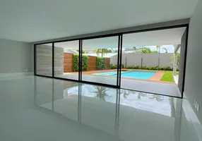 Foto 1 de Casa de Condomínio com 5 Quartos à venda, 1200m² em Barra da Tijuca, Rio de Janeiro