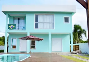 Foto 1 de Casa de Condomínio com 4 Quartos para venda ou aluguel, 240m² em Canasvieiras, Florianópolis