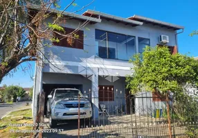 Foto 1 de Casa com 5 Quartos à venda, 136m² em Guajuviras, Canoas