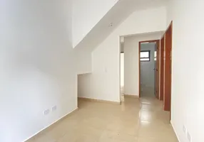 Foto 1 de Casa de Condomínio com 2 Quartos à venda, 49m² em Vila Tupi, Praia Grande