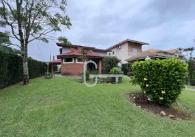 Foto 1 de Casa de Condomínio com 4 Quartos à venda, 263m² em Bougainvillee III, Peruíbe