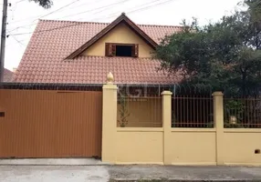 Foto 1 de Casa com 3 Quartos à venda, 251m² em Jardim Botânico, Porto Alegre