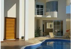 Foto 1 de Casa com 4 Quartos para venda ou aluguel, 360m² em Indaiá, Caraguatatuba