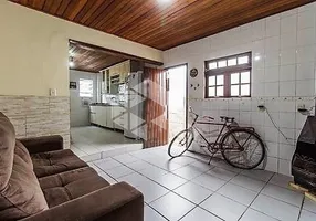 Foto 1 de Casa com 3 Quartos à venda, 89m² em Menino Deus, Porto Alegre