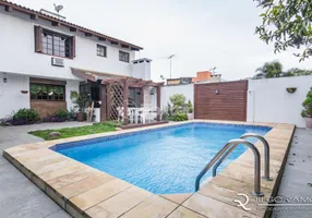 Foto 1 de Casa com 5 Quartos à venda, 238m² em Ipanema, Porto Alegre