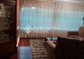 Foto 1 de Sobrado com 5 Quartos à venda, 272m² em Jardim Planalto, Porto Alegre