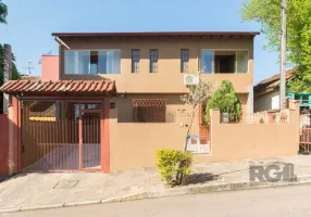 Foto 1 de Casa com 4 Quartos à venda, 266m² em Cavalhada, Porto Alegre