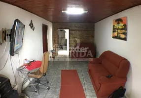 Foto 1 de Casa com 2 Quartos à venda, 200m² em Vila Nova, Porto Alegre