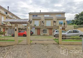 Foto 1 de Casa de Condomínio com 2 Quartos à venda, 93m² em Vila Nova, Porto Alegre